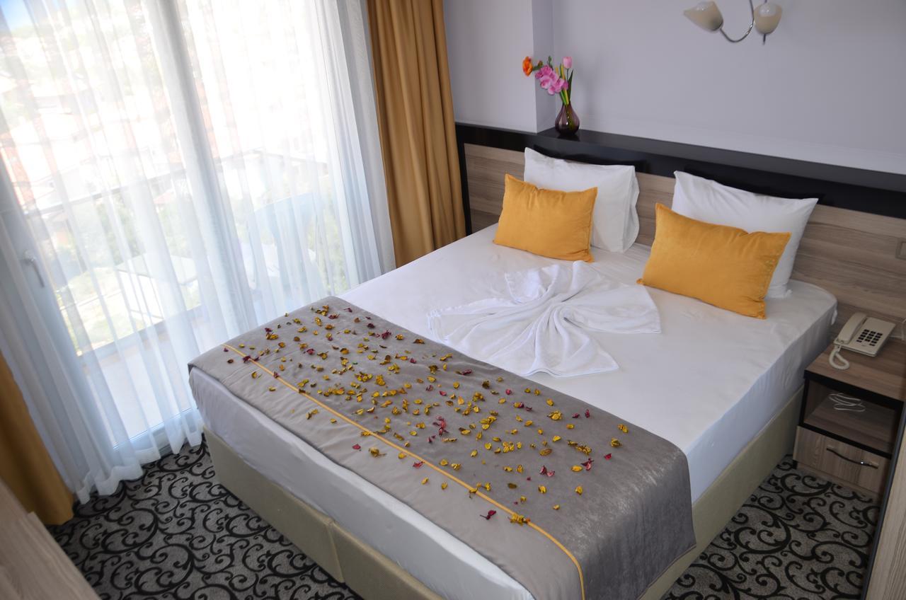 Elisa Hotel Айвалык Номер фото